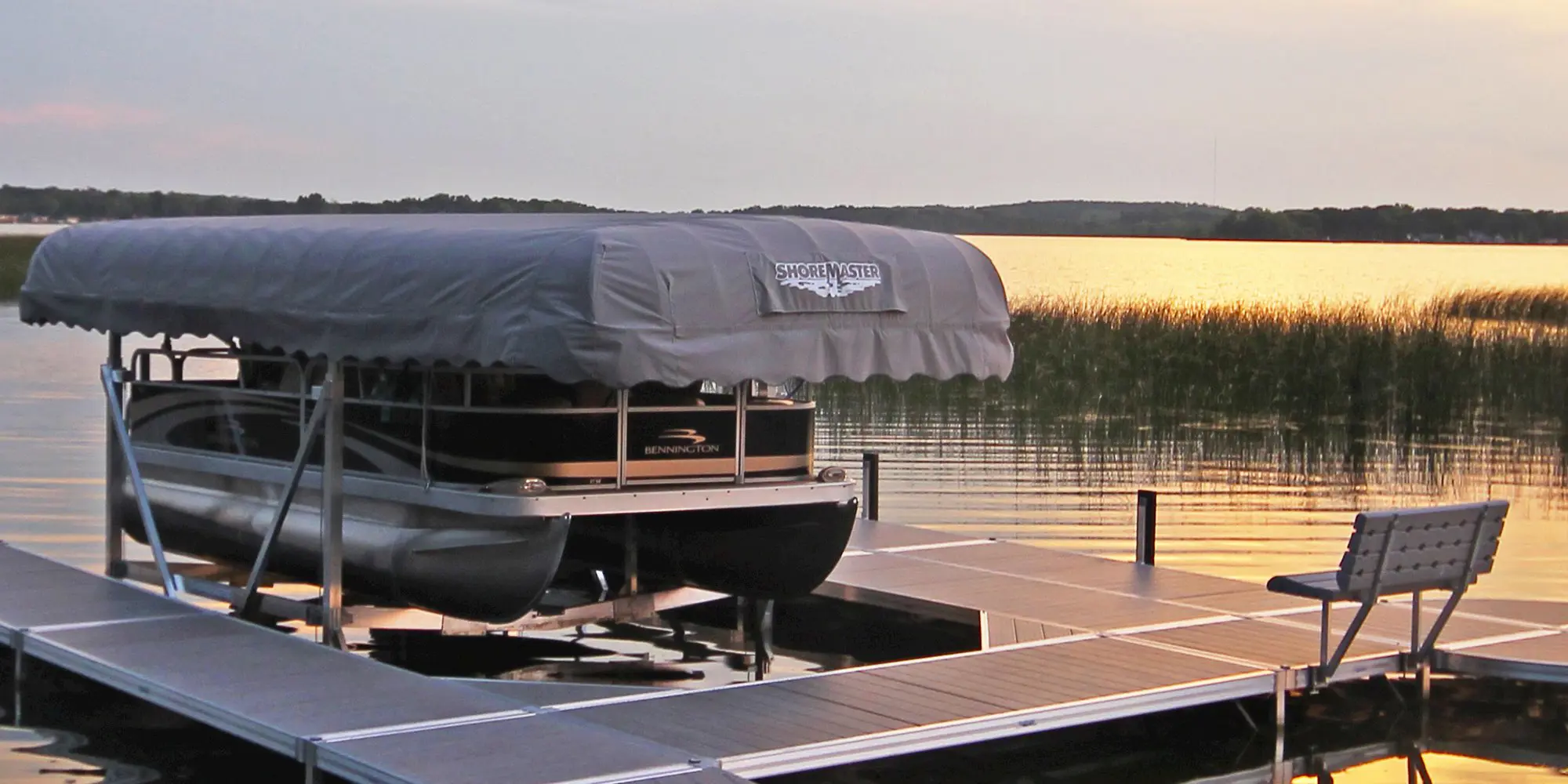 kwelch_graycanopy_verticallift_pontoon_graywoodgrain_rs4_bench_bumpers_2000.jpg